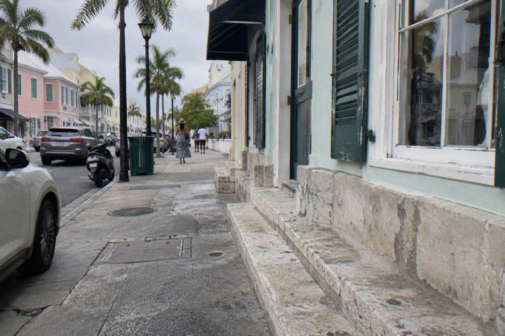 Colorful seafood shacks along the Arawak Cay strip with outdoor picnic tables