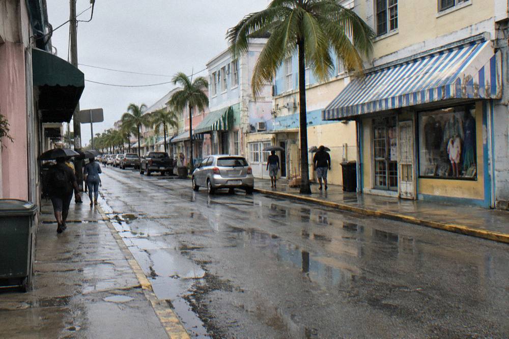 Pastel-colored colonial buildings along a downtown Nassau street near the cruise port