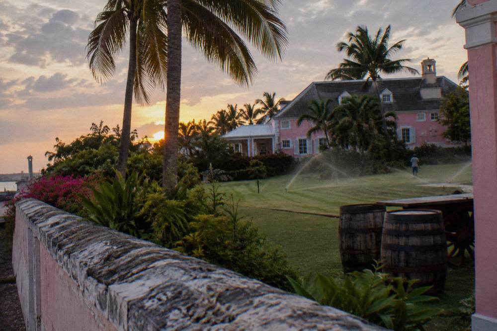 Historic stone estate building surrounded by tropical gardens in Nassau