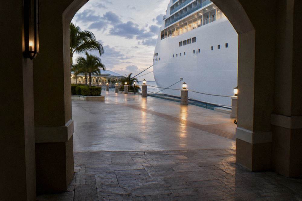 Cruise ship docked at Prince George Wharf seen from a Nassau street
